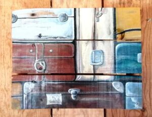 Palette peinte par l'artiste Gilles Lavie: valises imbriquées